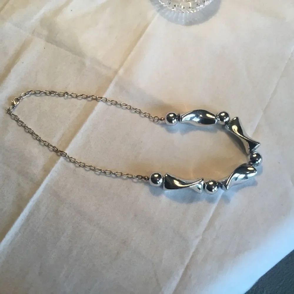 $8 ea or 3/$15. Silvertone Geometric Necklace